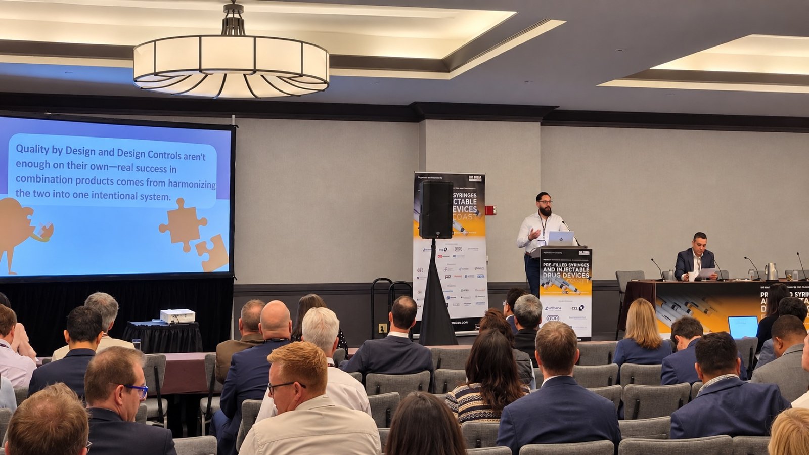 Subhi delivering a presentation on harmonizing drug and device approaches